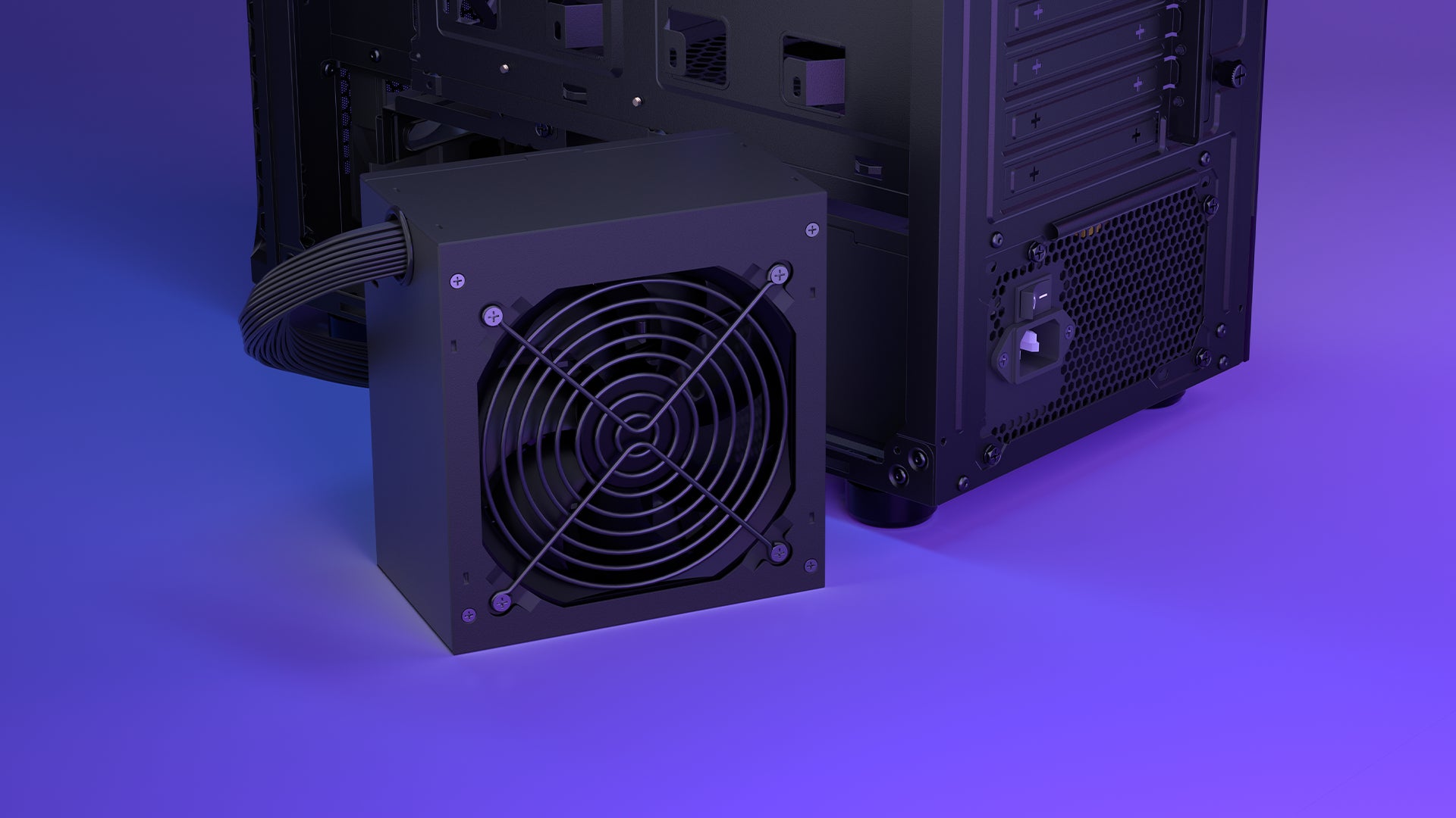 Tył obudowy PC ze stojącym obok zasilaczem ENDORFY Elementum E5 550 W z widocznym wentylatorem 120 mm 
