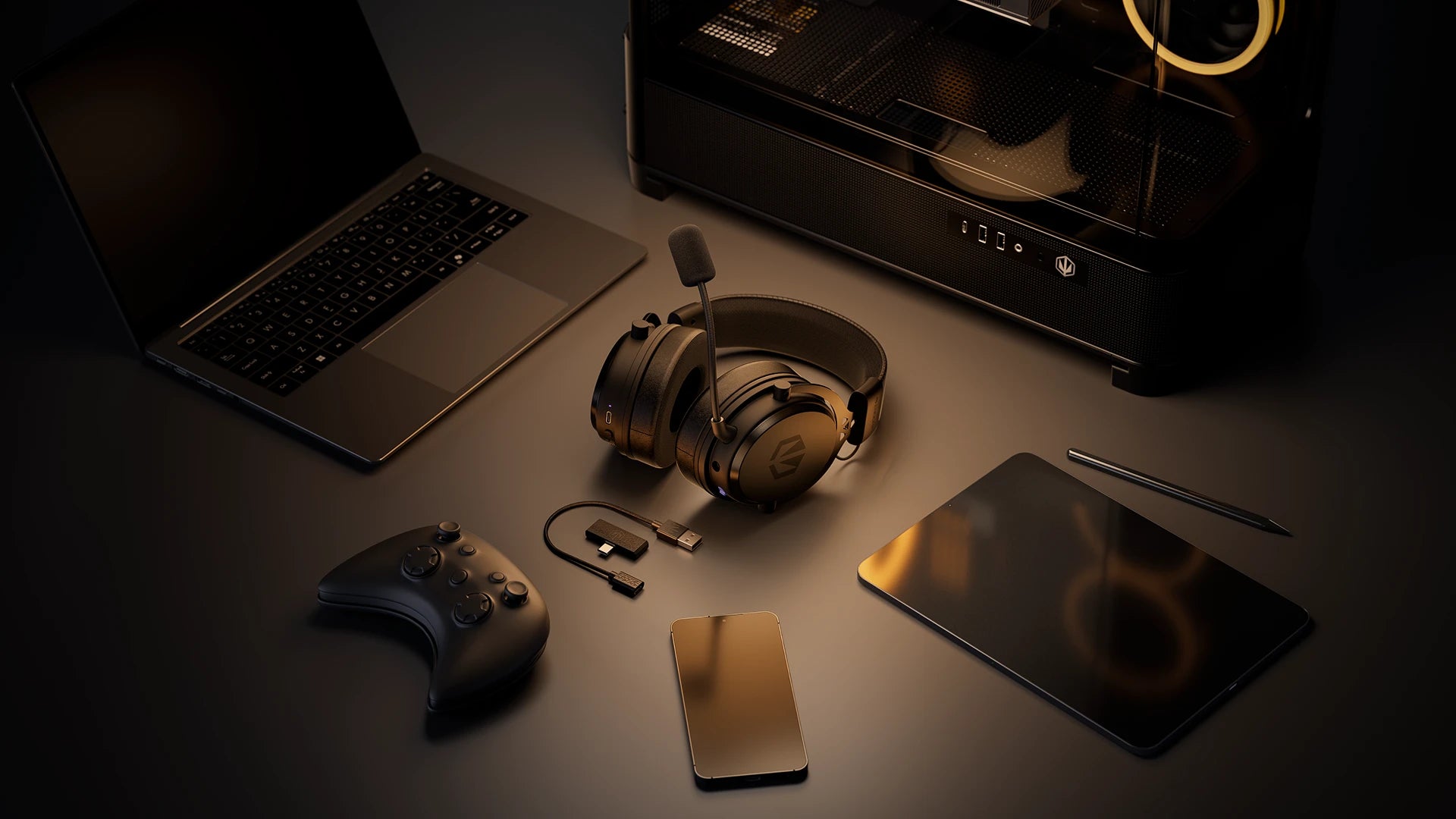 ENDORFY Viro Wireless headphones lying on a desk surrounded by portable devices – a laptop, gamepad, smartphone and tablet – and a desktop computer