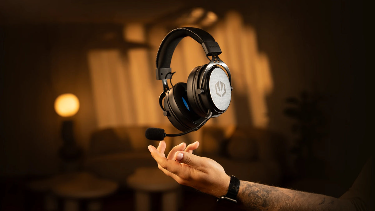 ENDORFY Viro Wireless headphones floating above a model’s hand