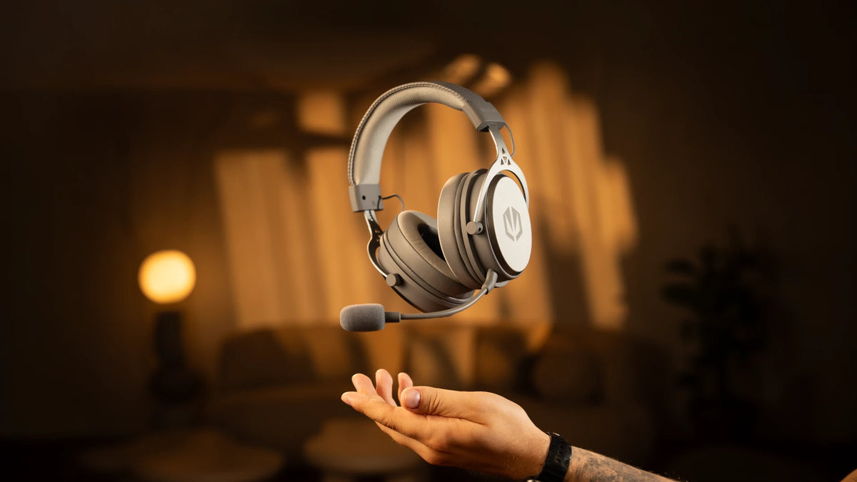ENDORFY Viro Wireless Alt Gray headphones floating above a model’s hand