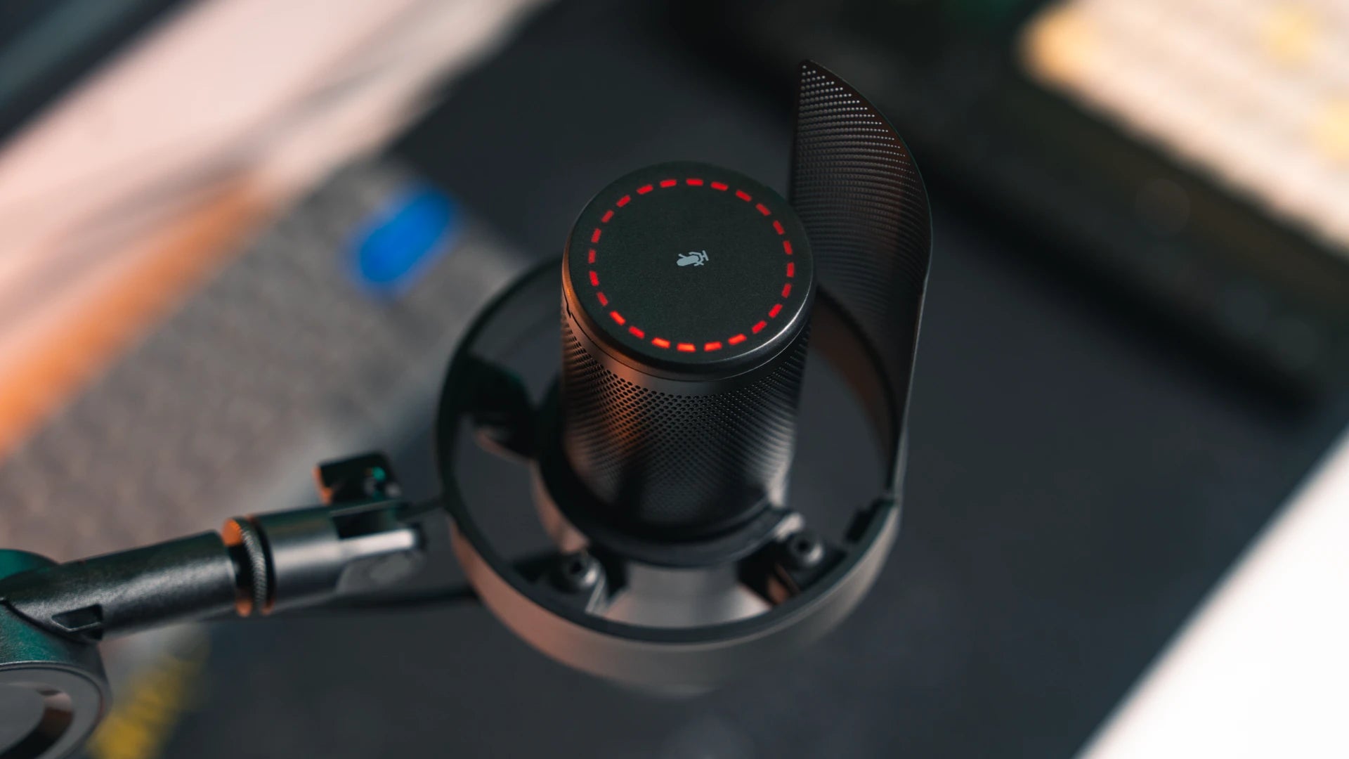 Close-up of the open shock mount holding the Solum 2 Boom Arm microphone